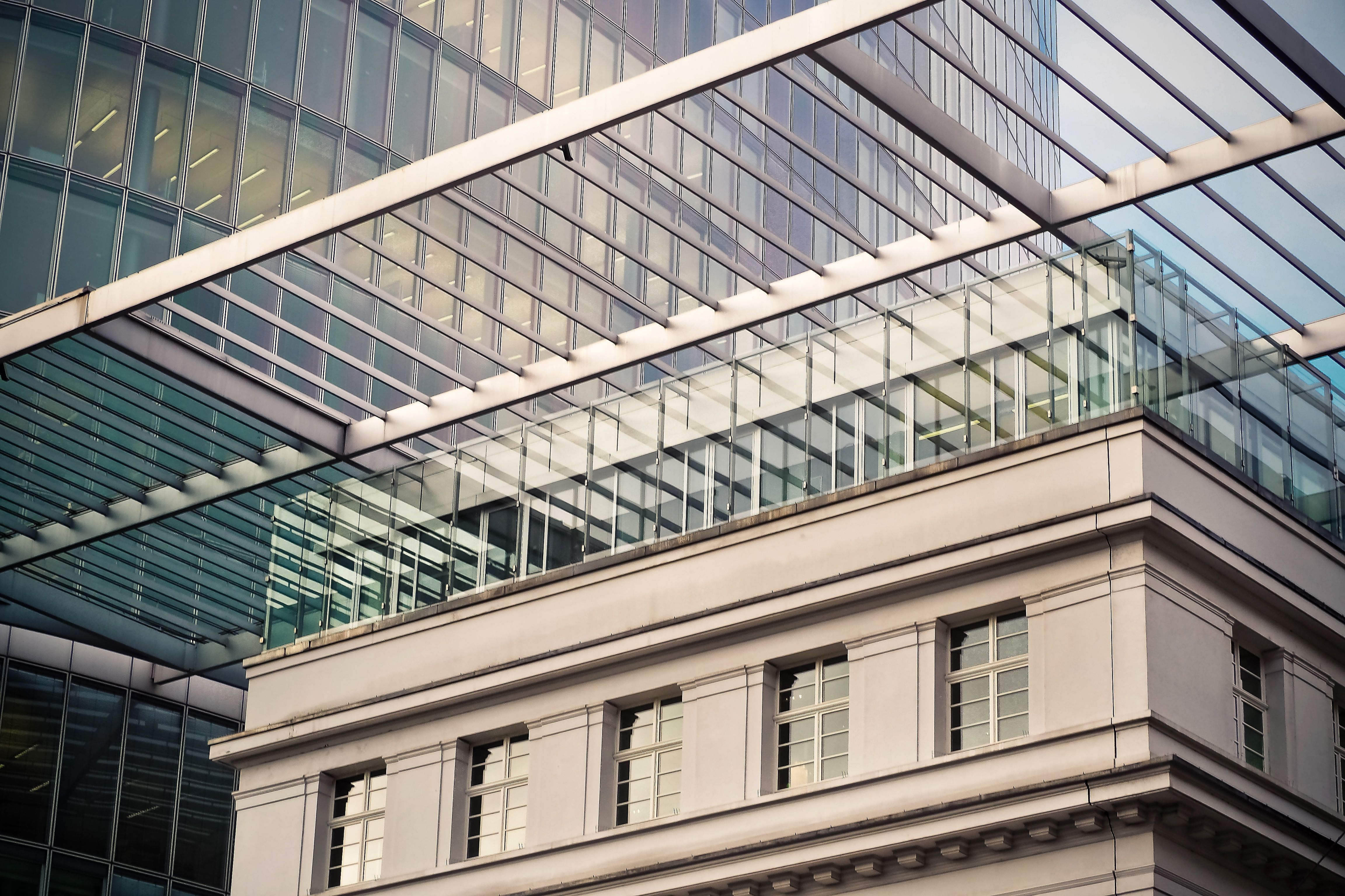 Modern glass office building symbolizing openness and transparency in business.