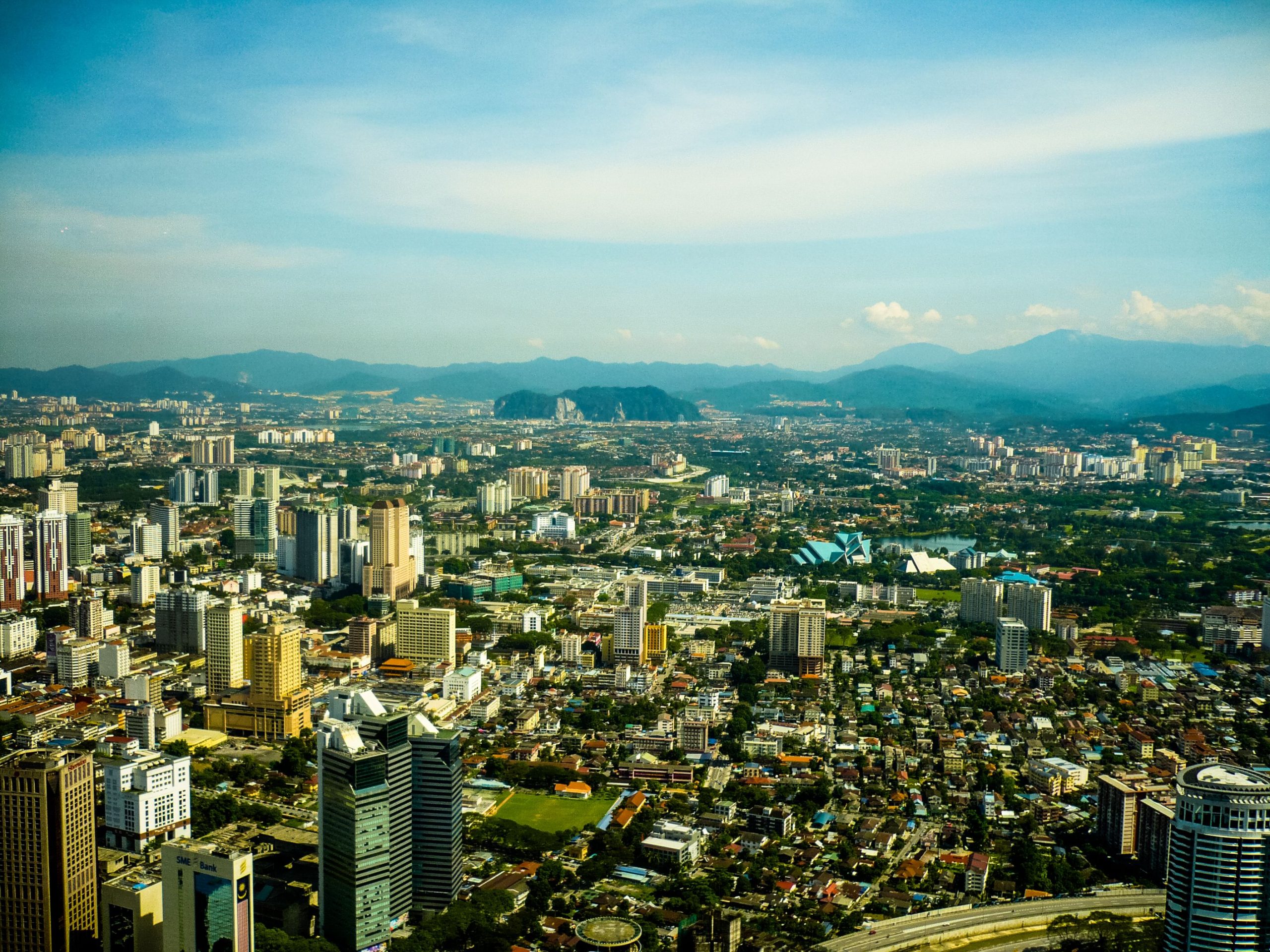 Aerial view of Kuala Lumpur's modern skyline and high-rise development in Malaysia.